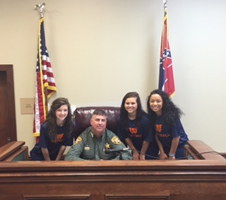 Sheriff Ashley with cheerleaders